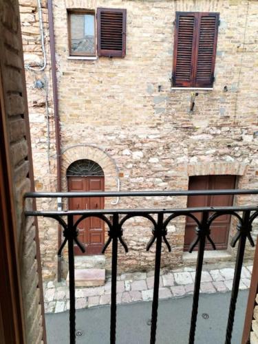 a view of a building from a balcony at Appartamento Nonna Milde in Assisi