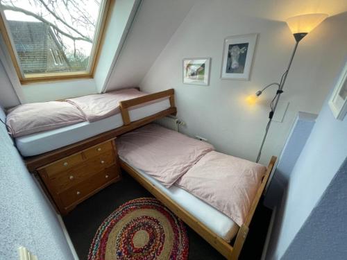 Postel nebo postele na pokoji v ubytování Landhaus up de Warft - Störtebecker