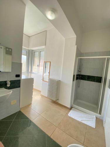 a bathroom with a shower and a sink at Abruzzi 81 in Lecce