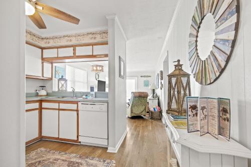 a kitchen with a sink and a counter top at Ocean Pier #122 in Myrtle Beach