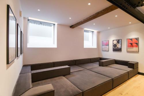 Posezení v ubytování Omnia by The Heim Residences