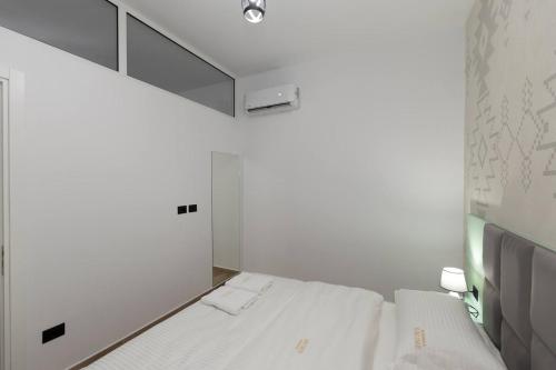 Cama o camas de una habitación en Sublime Bnb