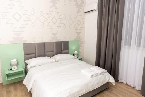 Cama o camas de una habitación en Sublime Bnb