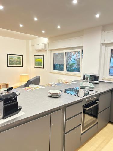 a kitchen with a large island in a room at Casa Riviera in Pescara