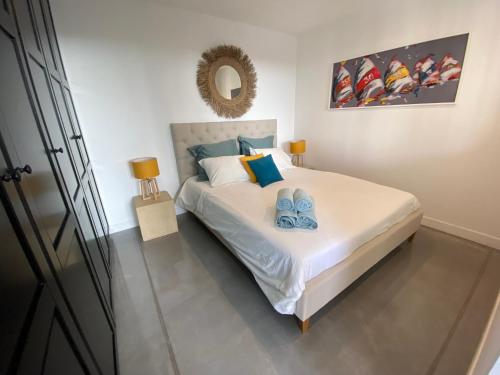 Ένα ή περισσότερα κρεβάτια σε δωμάτιο στο Appartement privé à la Villa Paradis de Valcros