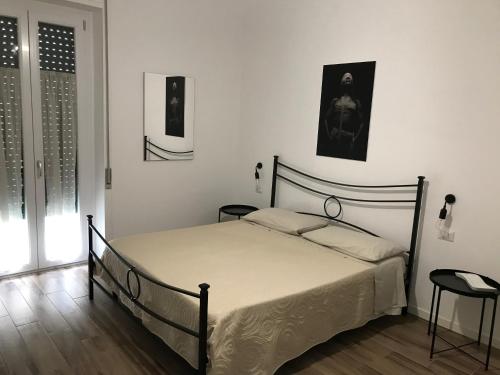 Postel nebo postele na pokoji v ubytování Latomia del Paradiso chambres et vacances