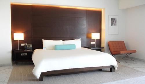 Кровать или кровати в номере Palacio Mundo Imperial Riviera Diamante Acapulco All Inclusive