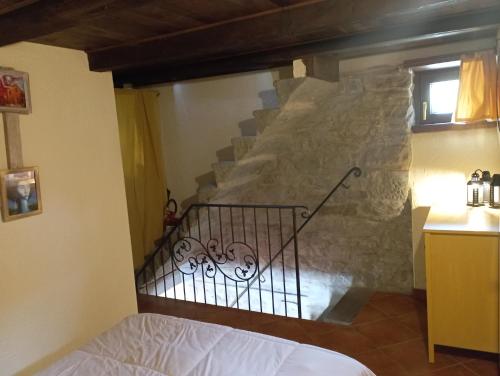 Postel nebo postele na pokoji v ubytování Torre Riva Dimora storica