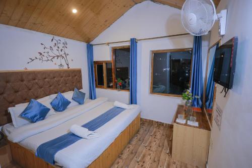 Cama o camas de una habitación en Snow River, Manali