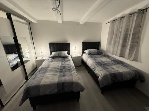 Ένα ή περισσότερα κρεβάτια σε δωμάτιο στο Apartman Žanić Ogulin with pool and jacuzzy