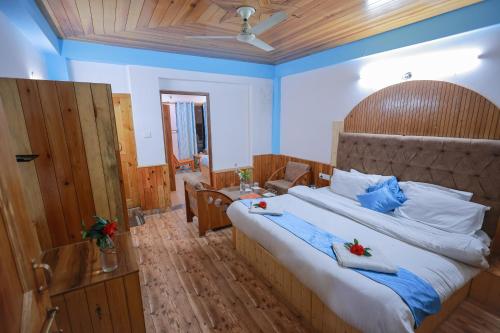 Cama o camas de una habitación en Snow River, Manali