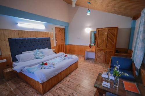 Cama o camas de una habitación en Snow River, Manali