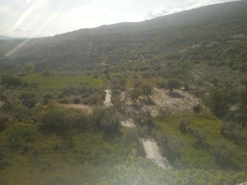 an aerial view of a valley with hills and trees at Casa Carrie in Válor