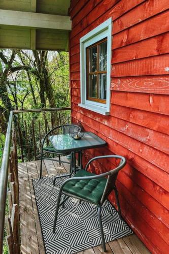 Un balcón o terraza en Elke's Tiny House