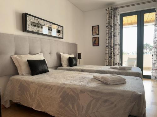 Postel nebo postele na pokoji v ubytování Marina Vilamoura Aquamar 209 By Vilamoura Sun