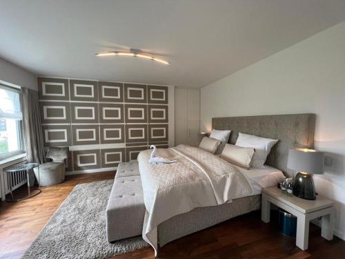 Кровать или кровати в номере Villa Düsseldorf