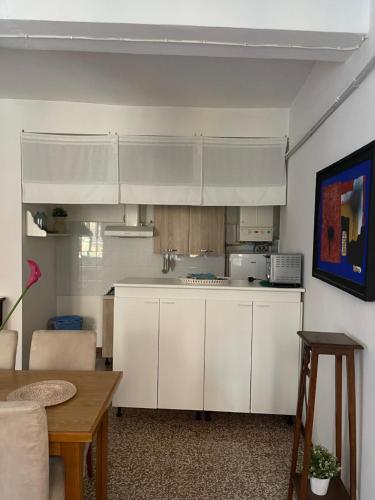 Kuchyň nebo kuchyňský kout v ubytování Bilocale Inzani