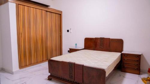 מיטה או מיטות בחדר ב-Villa residence AMI