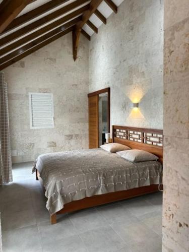 Llit o llits en una habitació de Villa Choisy