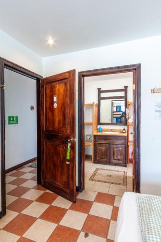 Postel nebo postele na pokoji v ubytování Posada Nena Santa Ana