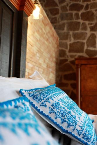 Una cama o camas en una habitación de Hotel Casa Xaa