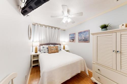 a bedroom with a bed and a ceiling fan at HH Beach & Tennis 322B in Hilton Head Island