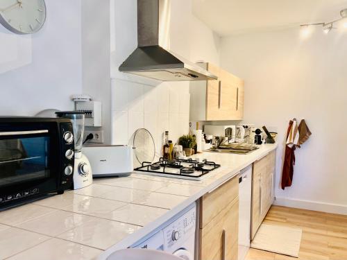Una cocina o cocineta en Loft entre mer et campagne à 5 min d'Ajaccio classé 4 étoiles