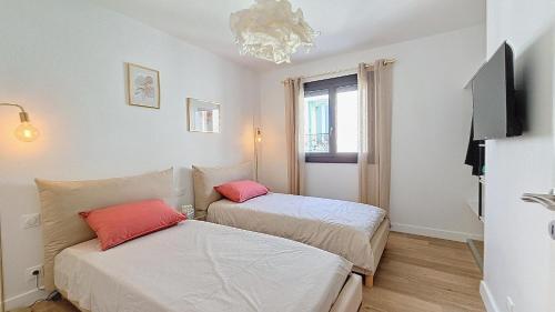 Ένα ή περισσότερα κρεβάτια σε δωμάτιο στο Maison entre canal et mer