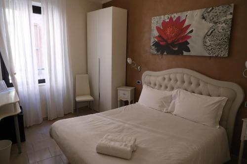 Hotel Central Giacominiにあるベッド