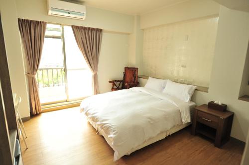 Cama o camas de una habitación en Jing Don B