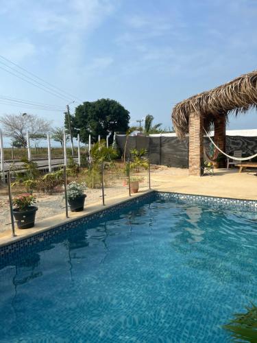 Piscine de l'établissement CABAÑA SOL Y MAR ou située à proximité