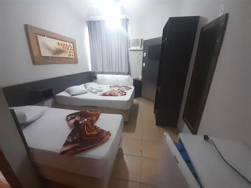 Katil atau katil-katil dalam bilik di Maranata Hotel
