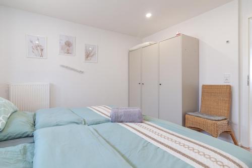 מיטה או מיטות בחדר ב-nJoy! Relax & Sunny - Panorama Therme - Terrasse - perfekt für Business & Spa