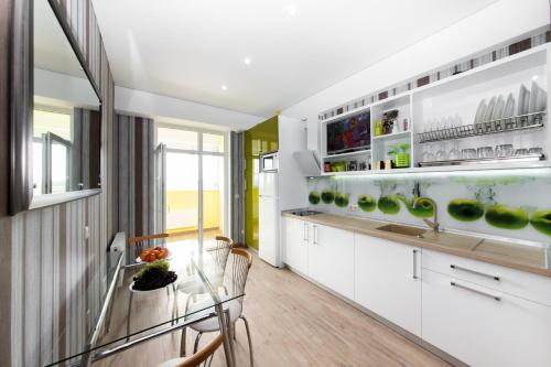 A kitchen or kitchenette at Chisinau Centre Apartments