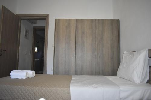 Ένα ή περισσότερα κρεβάτια σε δωμάτιο στο Irina's Apartment