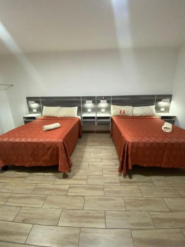 Postel nebo postele na pokoji v ubytování Hotel Sevilla Paraíso