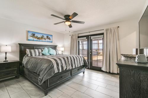 a bedroom with a bed and a ceiling fan at Lake Havasu City Home 4 Mi to London Bridge Beach in Lake Havasu City