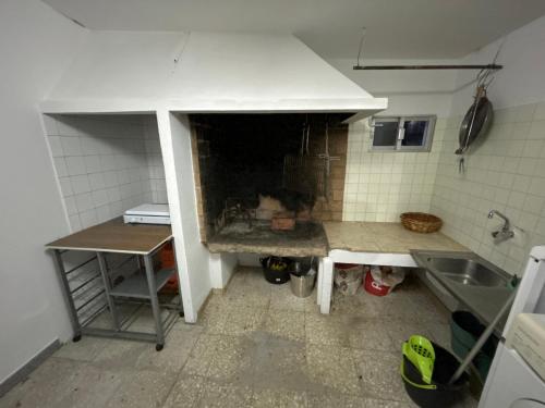 Kuchyň nebo kuchyňský kout v ubytování Outes centro