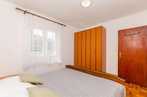 Ένα ή περισσότερα κρεβάτια σε δωμάτιο στο House Kelava