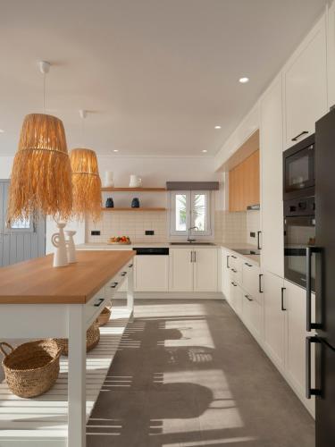 Dapur atau dapur kecil di Parosdise Luxury Suites