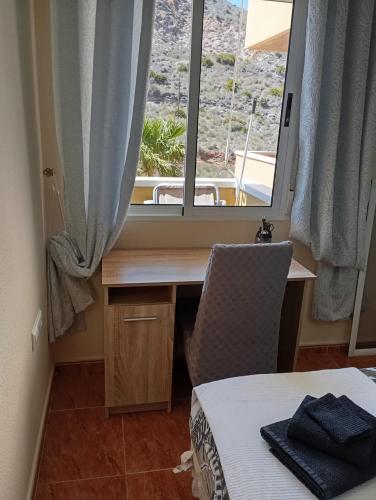 Postel nebo postele na pokoji v ubytování Cabo de Palos appartement Camelia