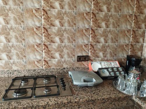 Cuisine ou kitchenette dans l'établissement Appartement Hajar