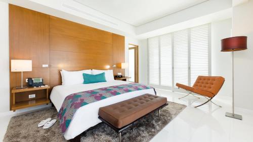 Кровать или кровати в номере Palacio Mundo Imperial Riviera Diamante Acapulco All Inclusive