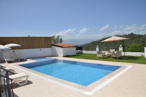 Πισίνα στο ή κοντά στο HYVillaS MİRAY