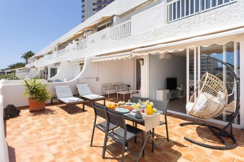 En balkon eller terrasse på Sunnyland Paraiso Beach