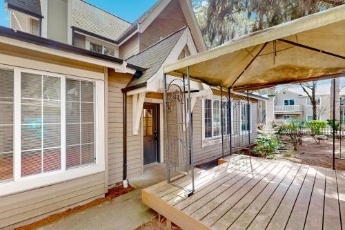 a porch of a house with a wooden deck at The Last House On The Left in Redmond