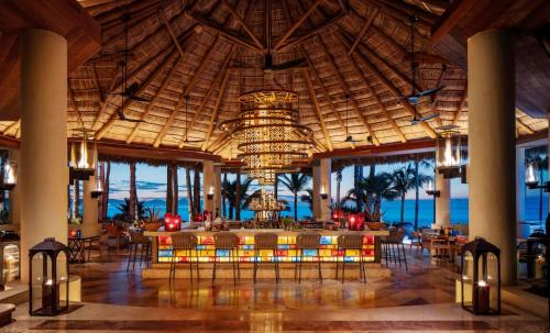 a lobby of a resort with a chandelier at One&Only Palmilla in San José del Cabo