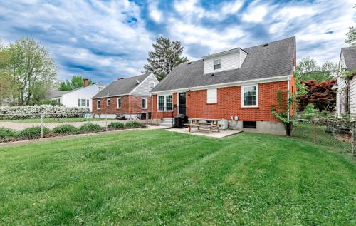 a brick house with a lawn in the yard at The Richmond - Fair Expo, Derby, YUM in Louisville