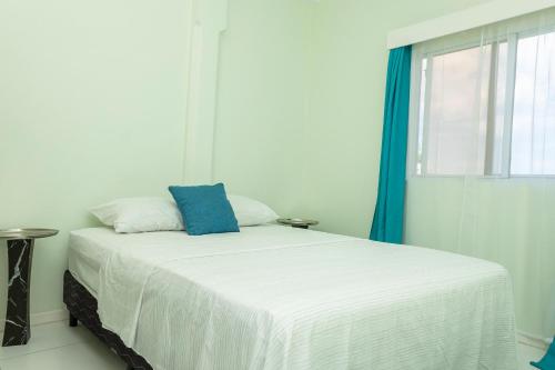Postel nebo postele na pokoji v ubytování Blue Horizon Apartments