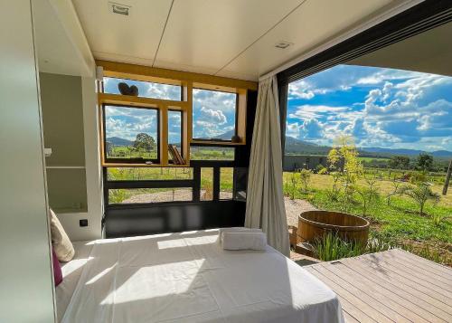 Postel nebo postele na pokoji v ubytování Moriá Village